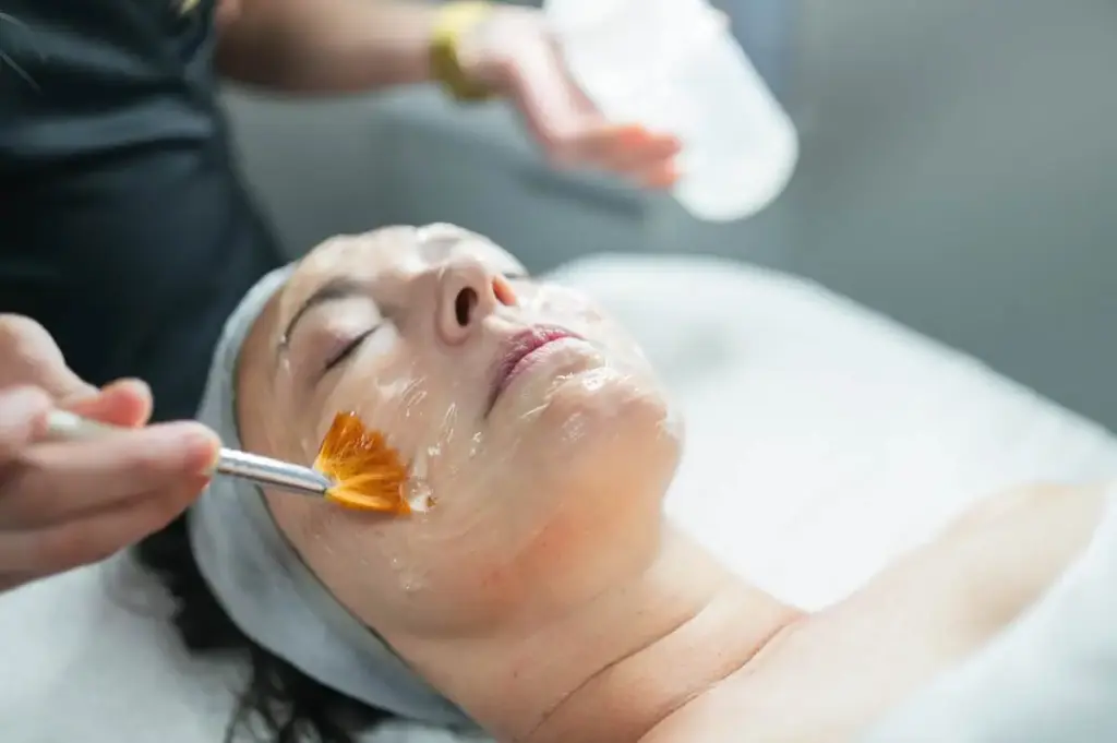 Woman receiving a hydrating facial treatment for dull skin at a med spa in Sacramento, CA.